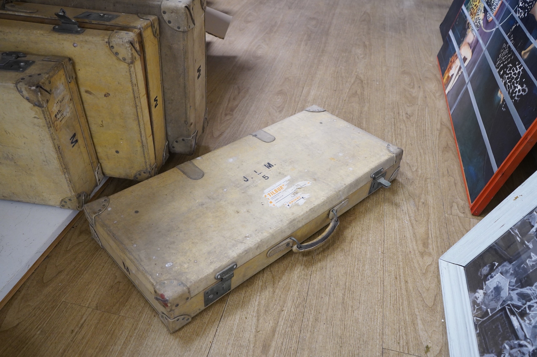 A collection of pig hide vintage luggage comprising six vintage travelling trunks